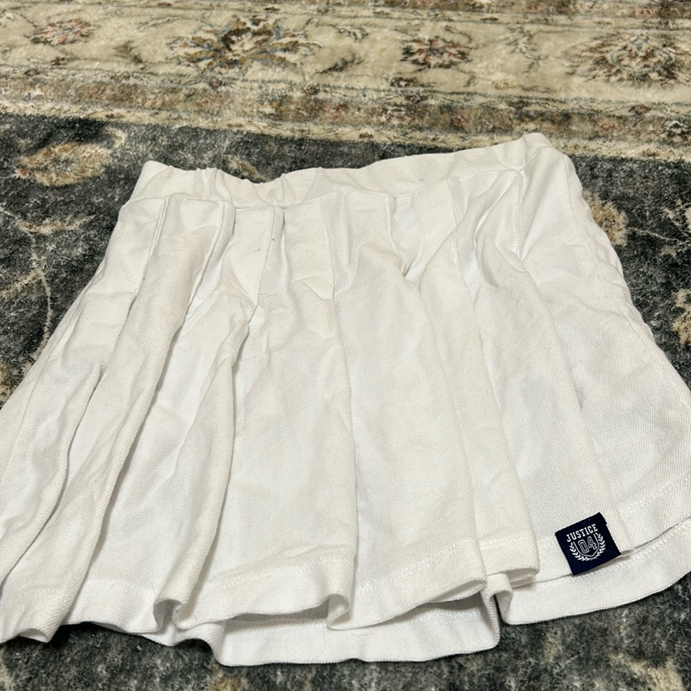 White Justic skirt/private school skirt.